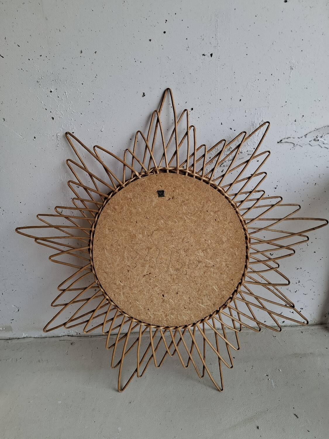 Vintage sun mirror in woven rattan
