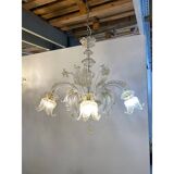 Lustre en verre transparent et doré avec fleurs et feuilles