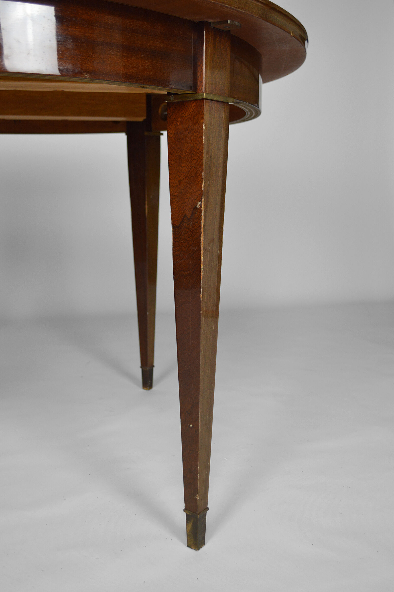 Art Deco mahogany round table by Jacques Adnet around 1940