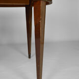 Art Deco mahogany round table by Jacques Adnet around 1940