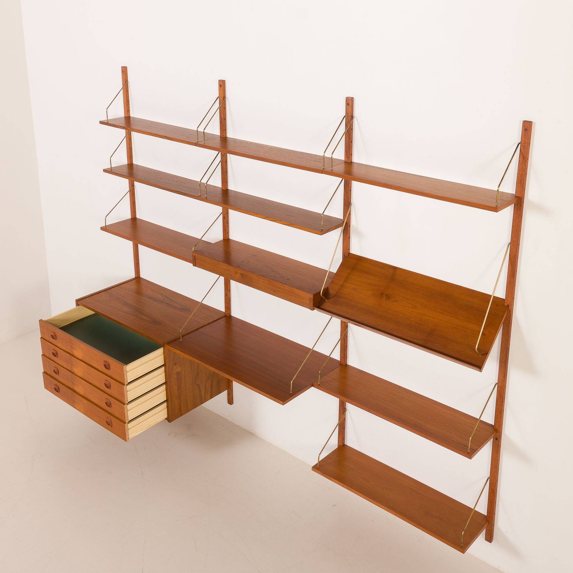 Danish teak wall unit in the style of Cadovius, Sorensen with a lamp, 1970s