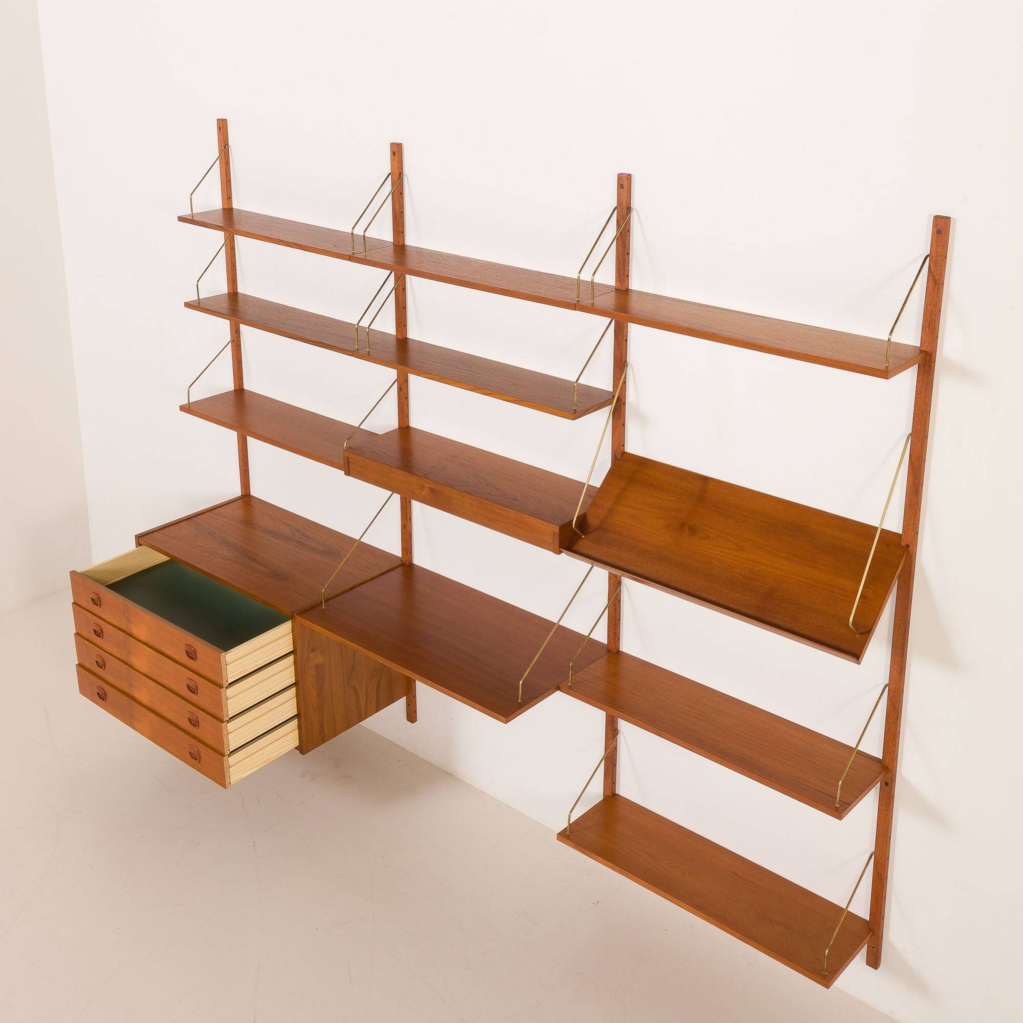 Danish teak wall unit in the style of Cadovius, Sorensen with a lamp, 1970s
