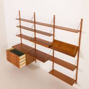 Danish teak wall unit in the style of Cadovius, Sorensen with a lamp, 1970s