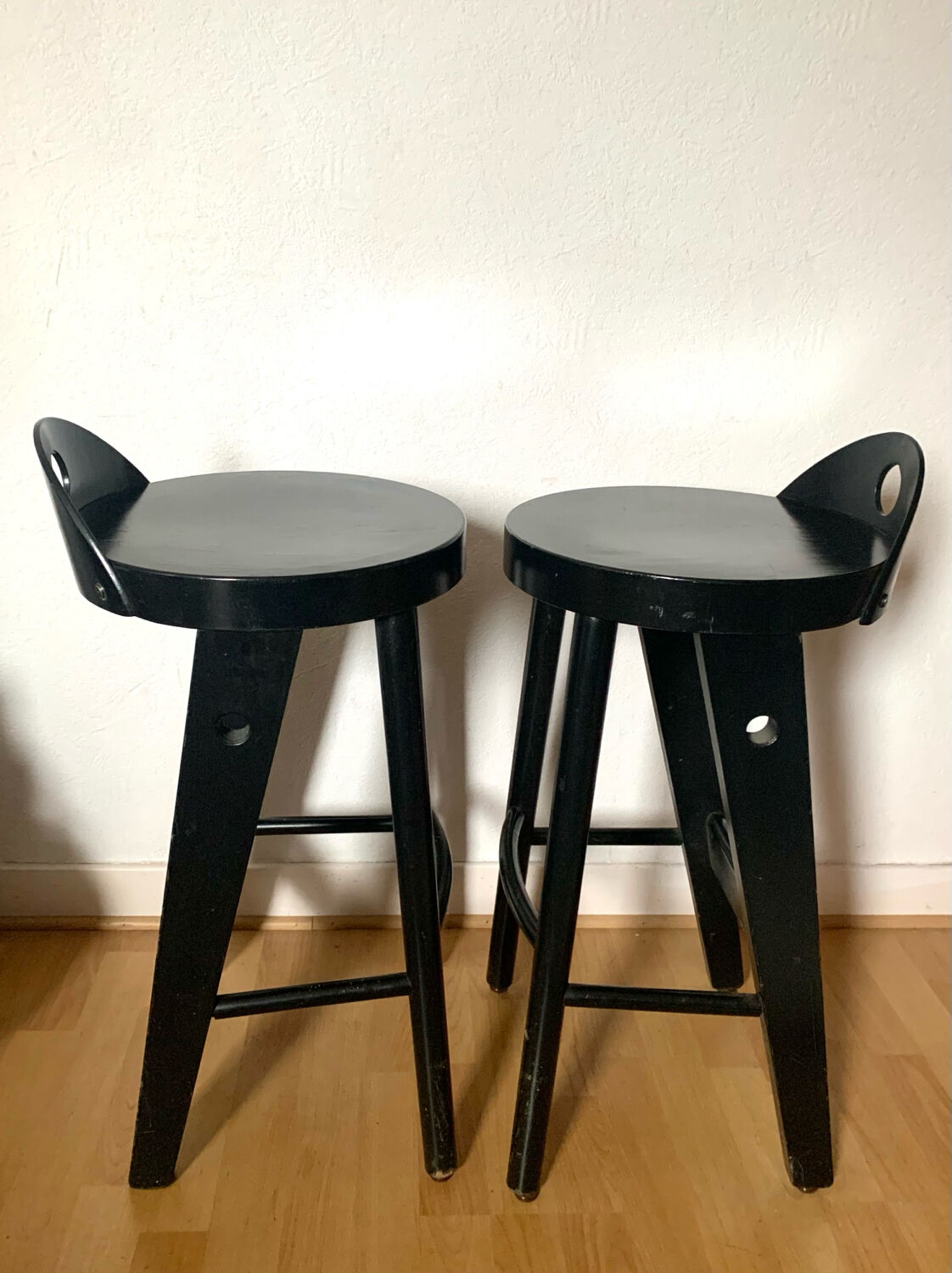 Pair of black designer stools by Baumann