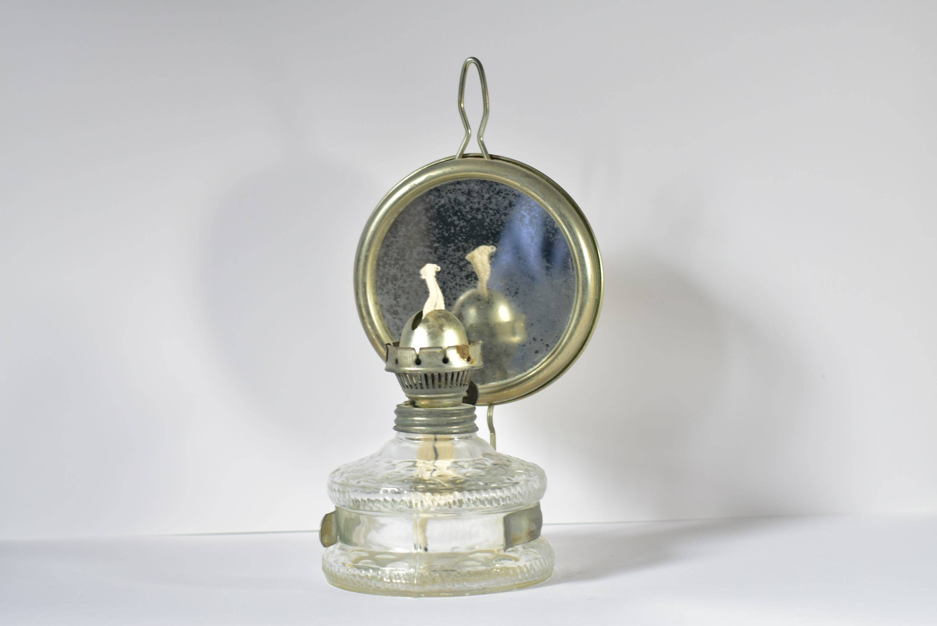 Vintage kerosene lamp with reflective mirror