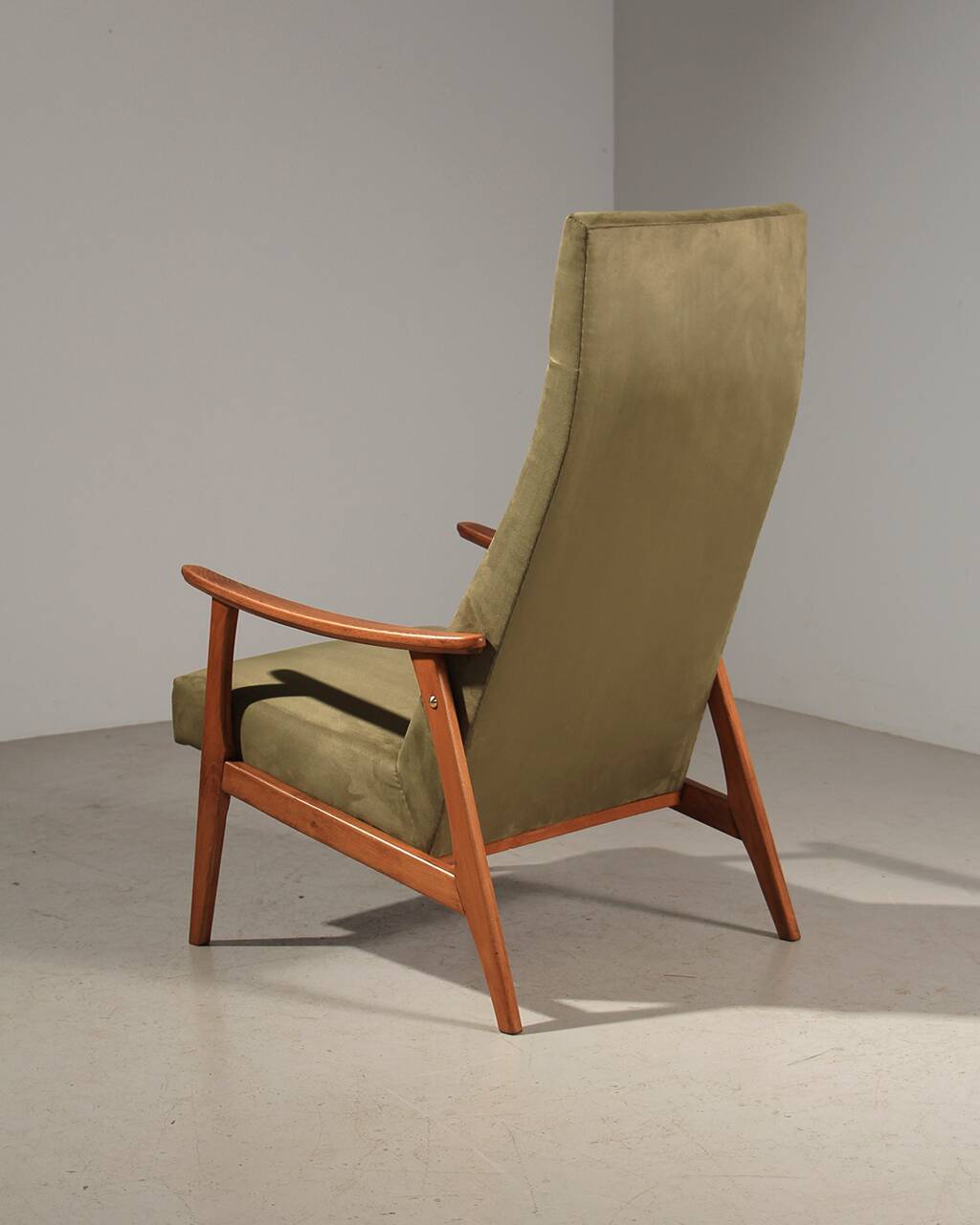 Vintage green velvet armchair