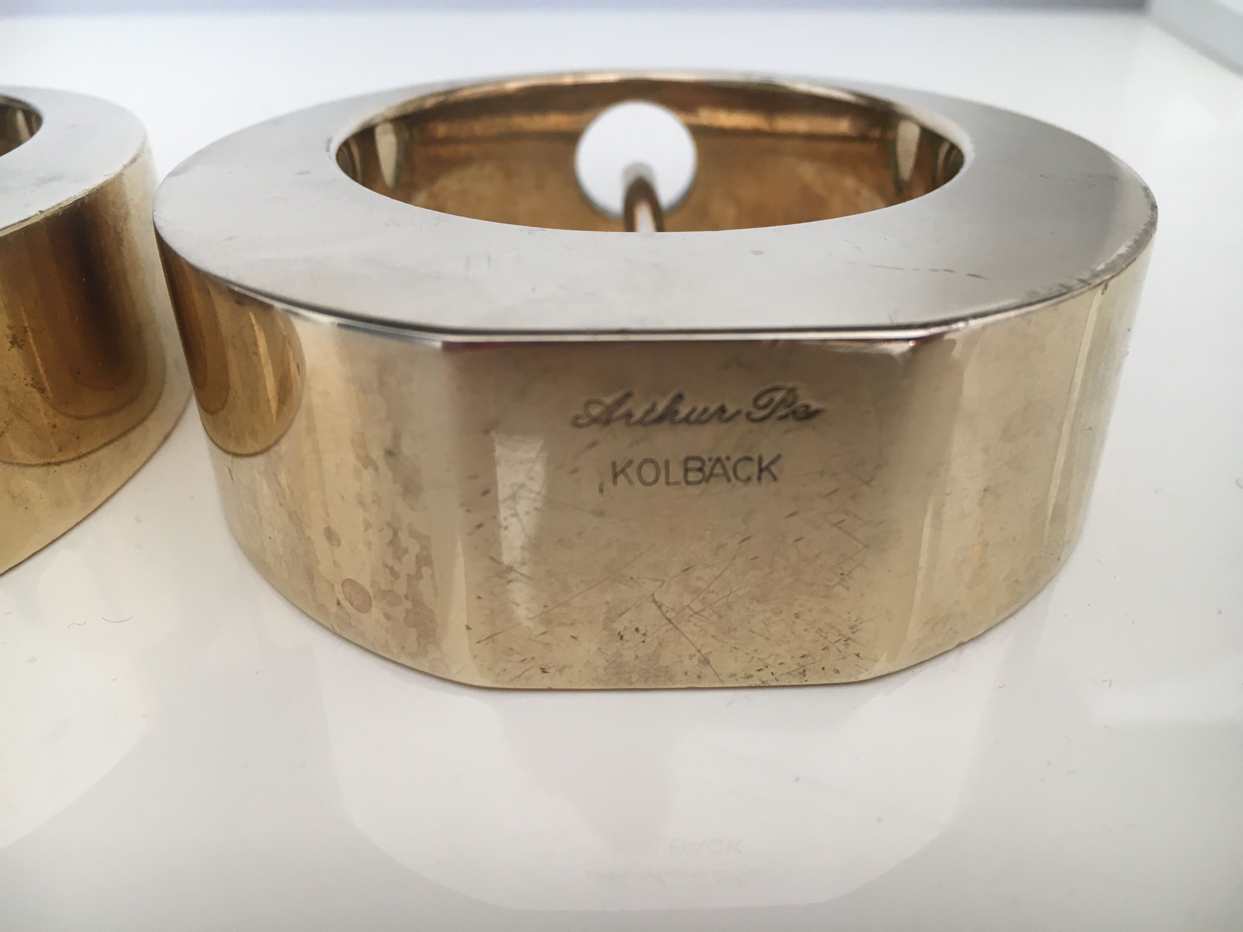 Pair of brass candle holders, Kolback