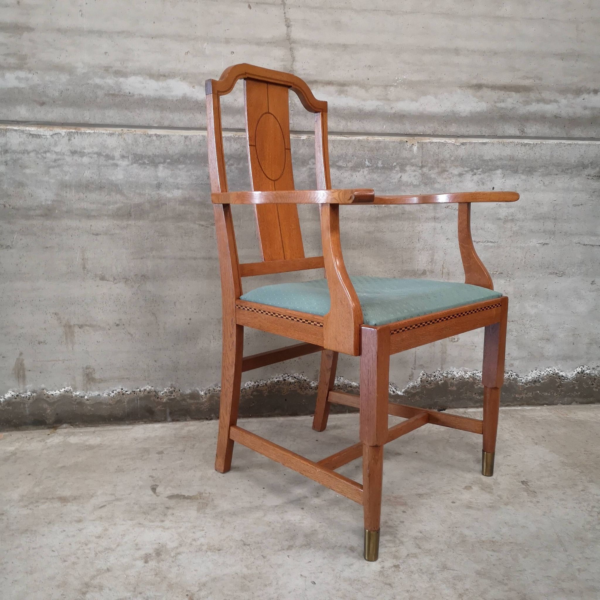 Art craft art nouveau armchair in oak and brass