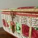 Vintage sewing basket in rattan and floral fabric