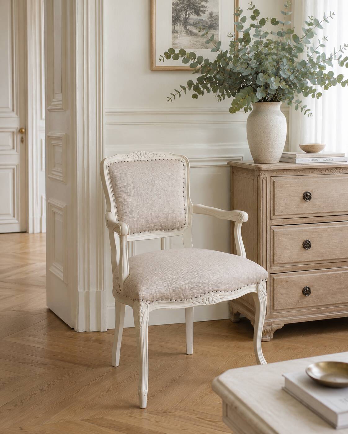 Louis XV style armchair in patinated beige, upholstered in beige fabric.