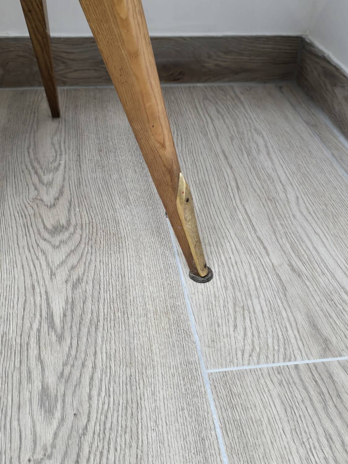 Pair of vintage tripod bedside tables from the 50s