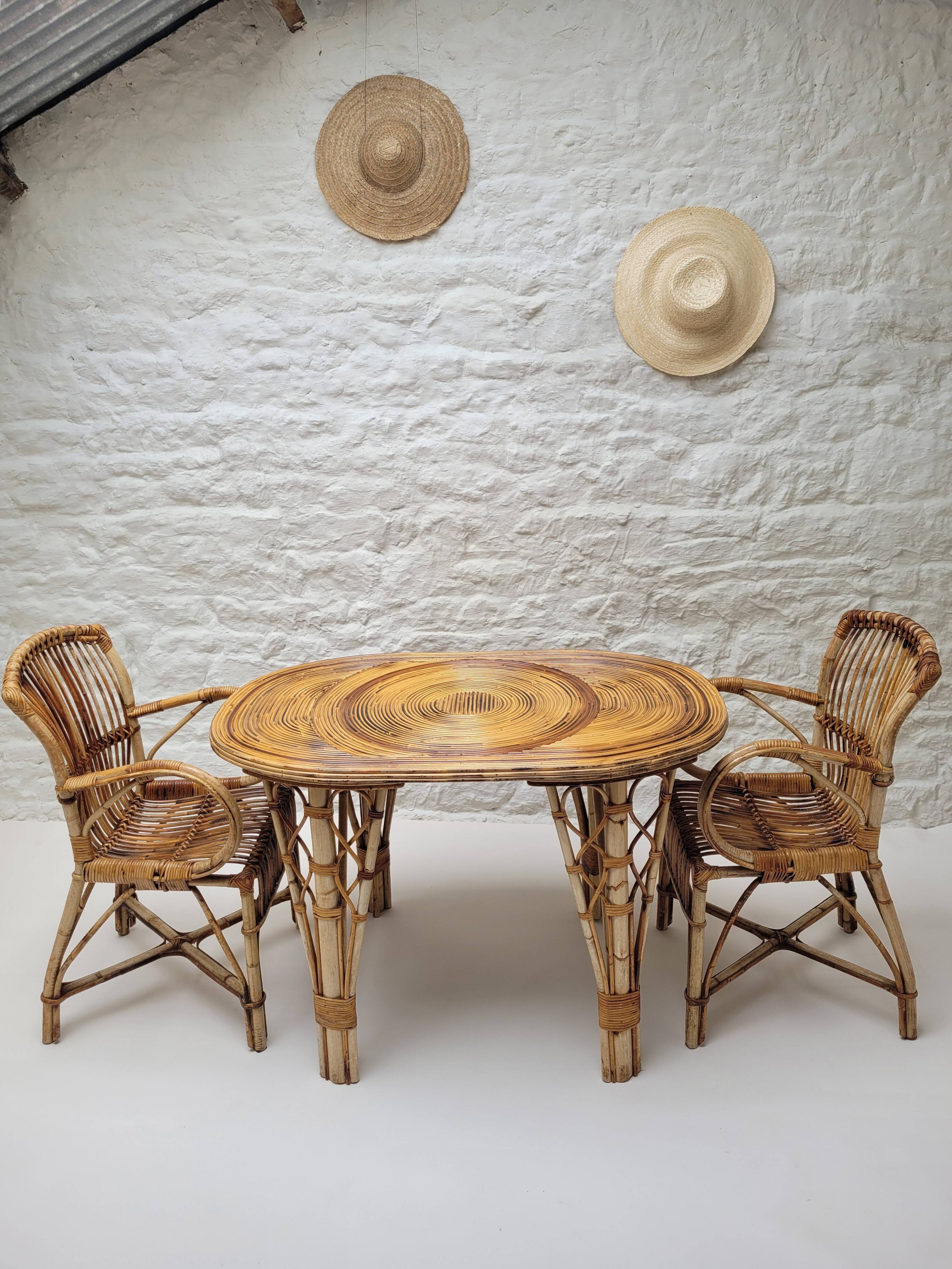 Vintage Audoux Minet bamboo, rattan, and smoked glass table duo.