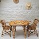 Vintage Audoux Minet bamboo, rattan, and smoked glass table duo.