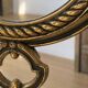 Vintage hanging mirror in gold metal and burgundy velvet – 63 × 24 cm