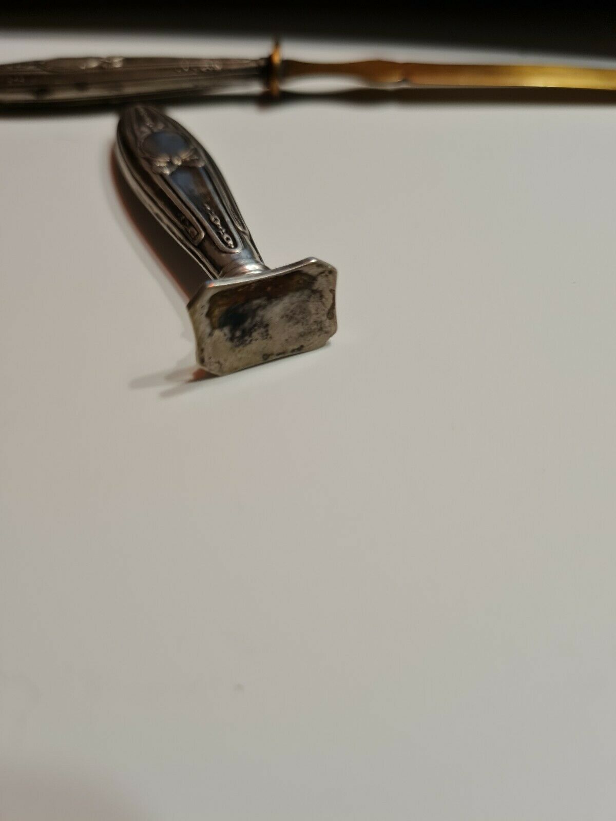 Paper cut with a stamp handle punches boar heads