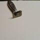 Paper cut with a stamp handle punches boar heads