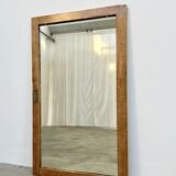 Antique mirror on an elm wardrobe door