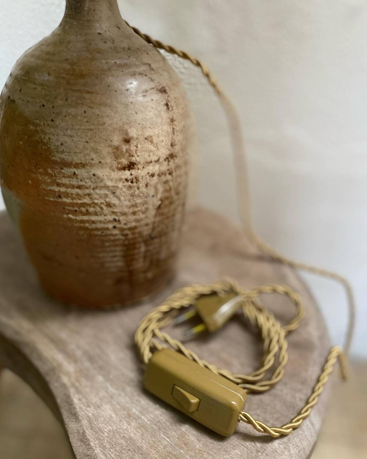 Large sandstone and rope lamp
