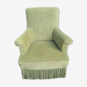 Old green velvet armchair with fringes / vintage