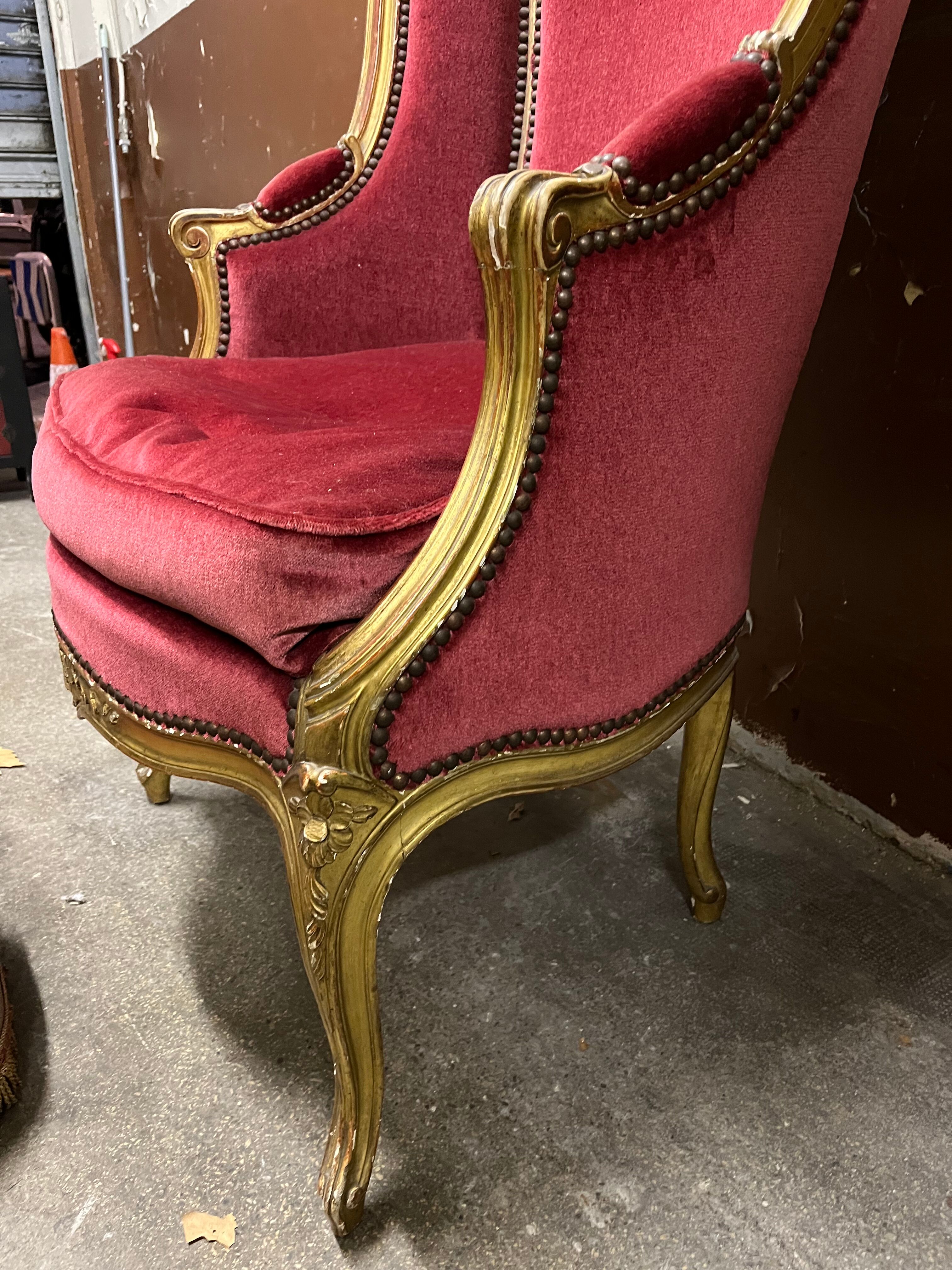 Gilded wooden armchair and footrest