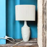 White ceramic table lamp with half lampshade