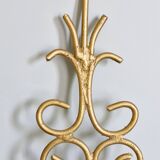 Gold wrought iron wall lights