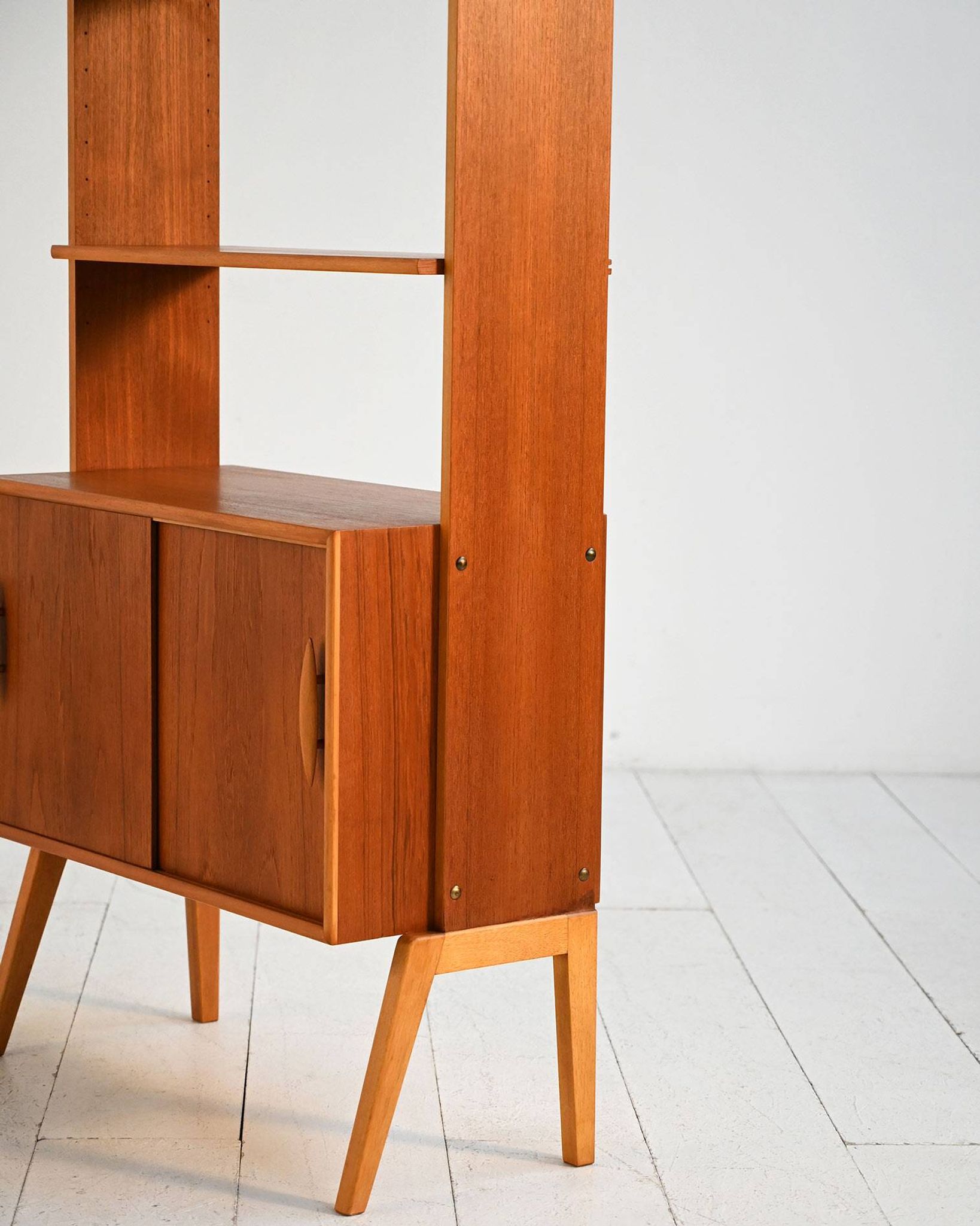 Scandinavian teak shelving unit with sliding doors, 1950s/60s