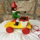 Old toy to pull Pinocchio and his xylophone