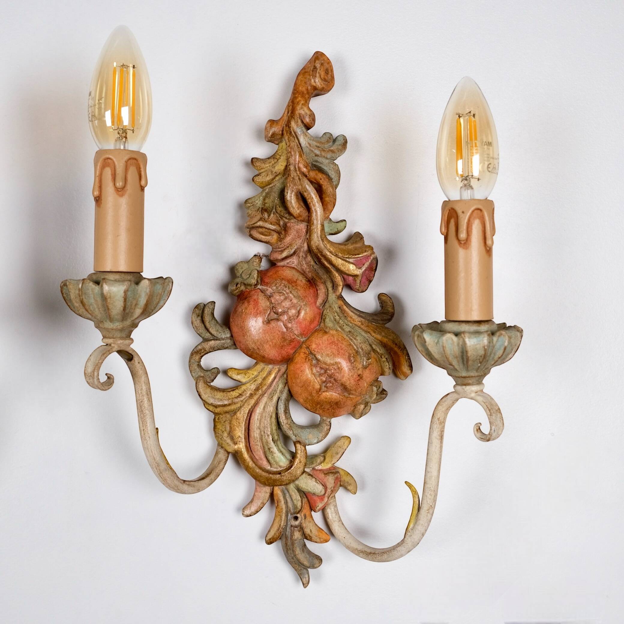 Pair of carved wood and metal sconces, Chelini FIrenze, Italy