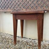 Headboard and its two wooden bedside tables.