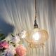 Suspension globe vintage en verre ambré