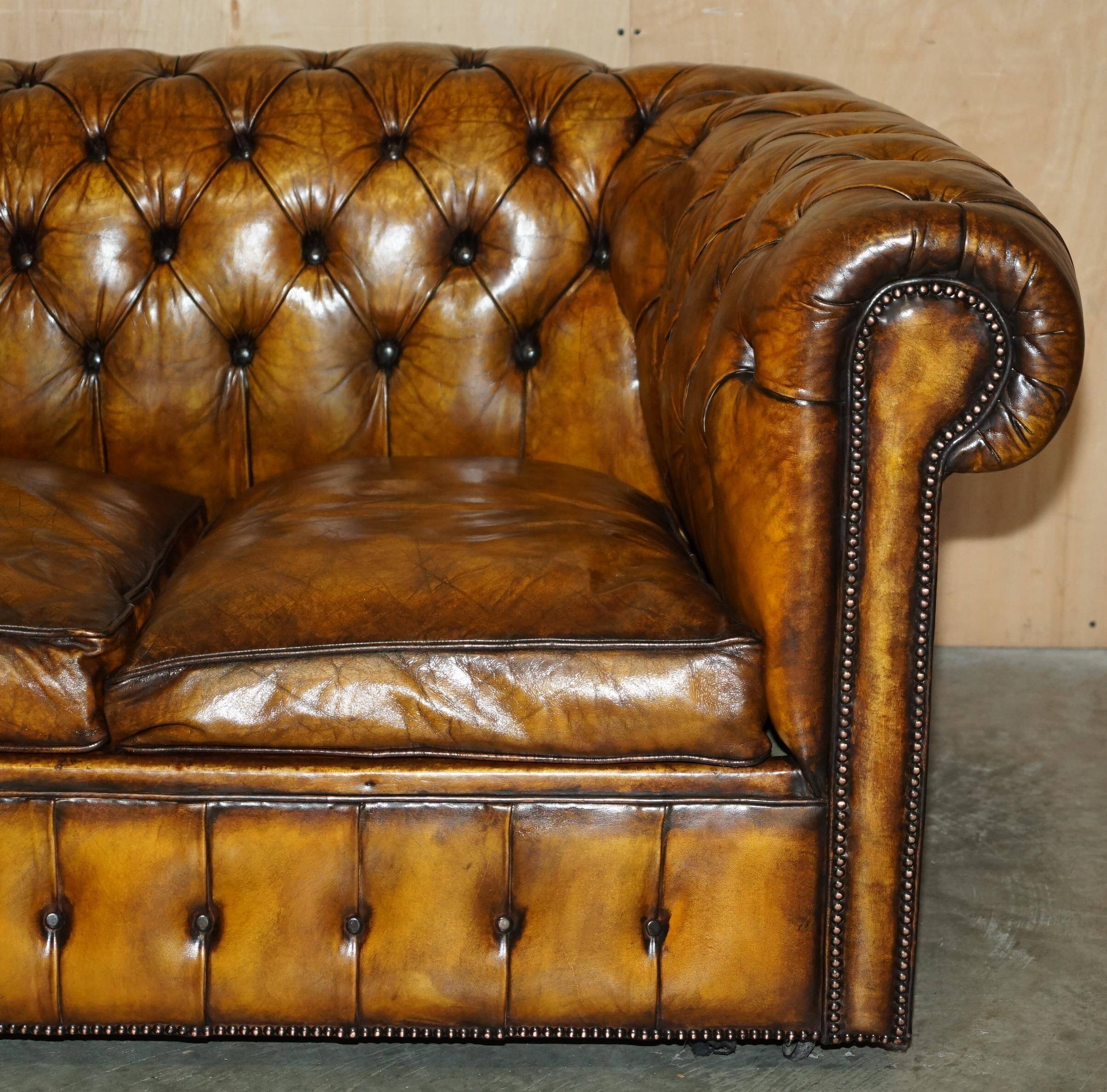 Vintage Chesterfield leather sofa bed, fully restored, circa 1940.