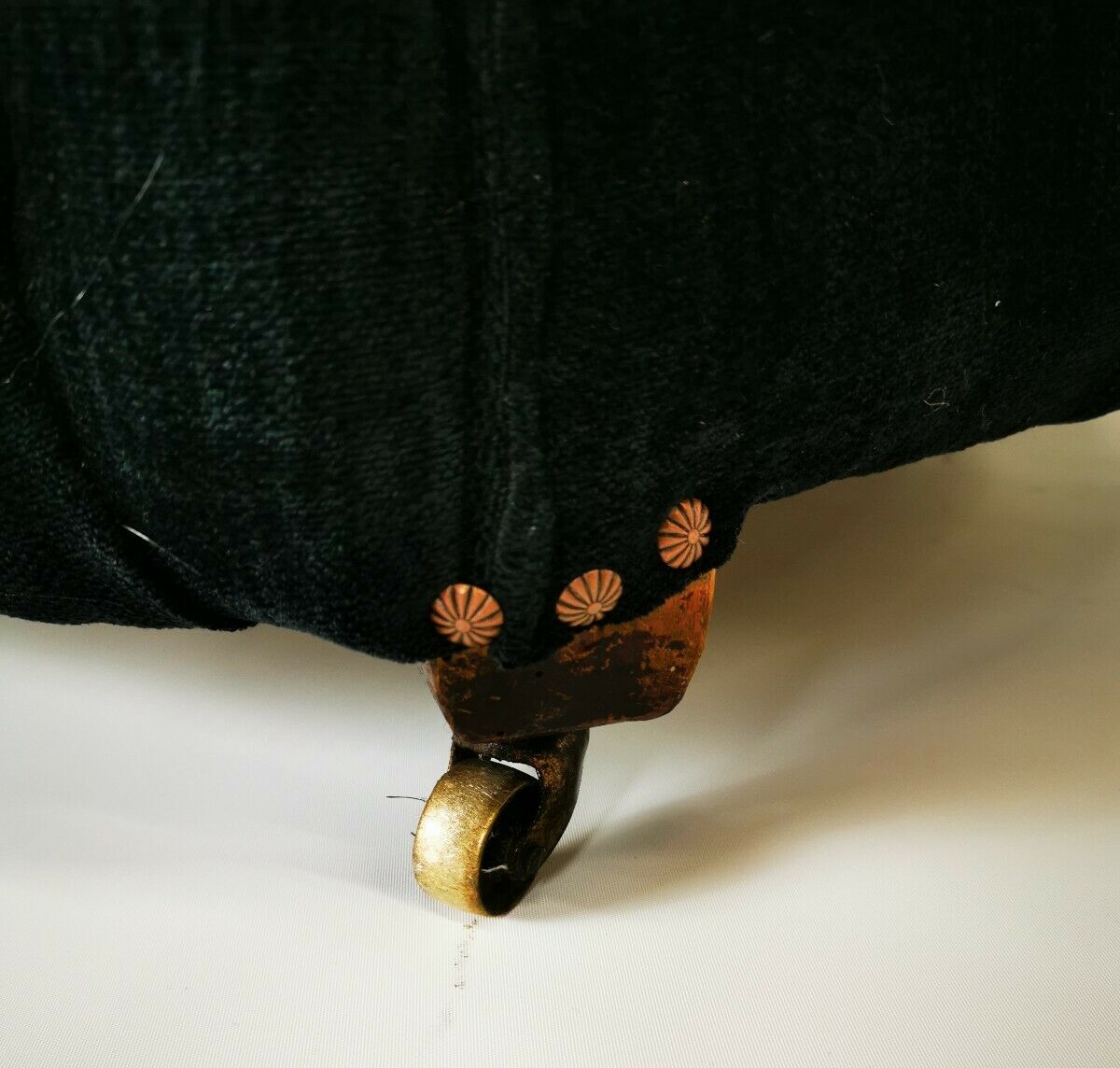 19th century black upholstered victorian tub chair on brass casters
