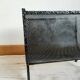 Cast iron magazine rack, circa 1950