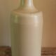 Vintage light stoneware liqueur bottle