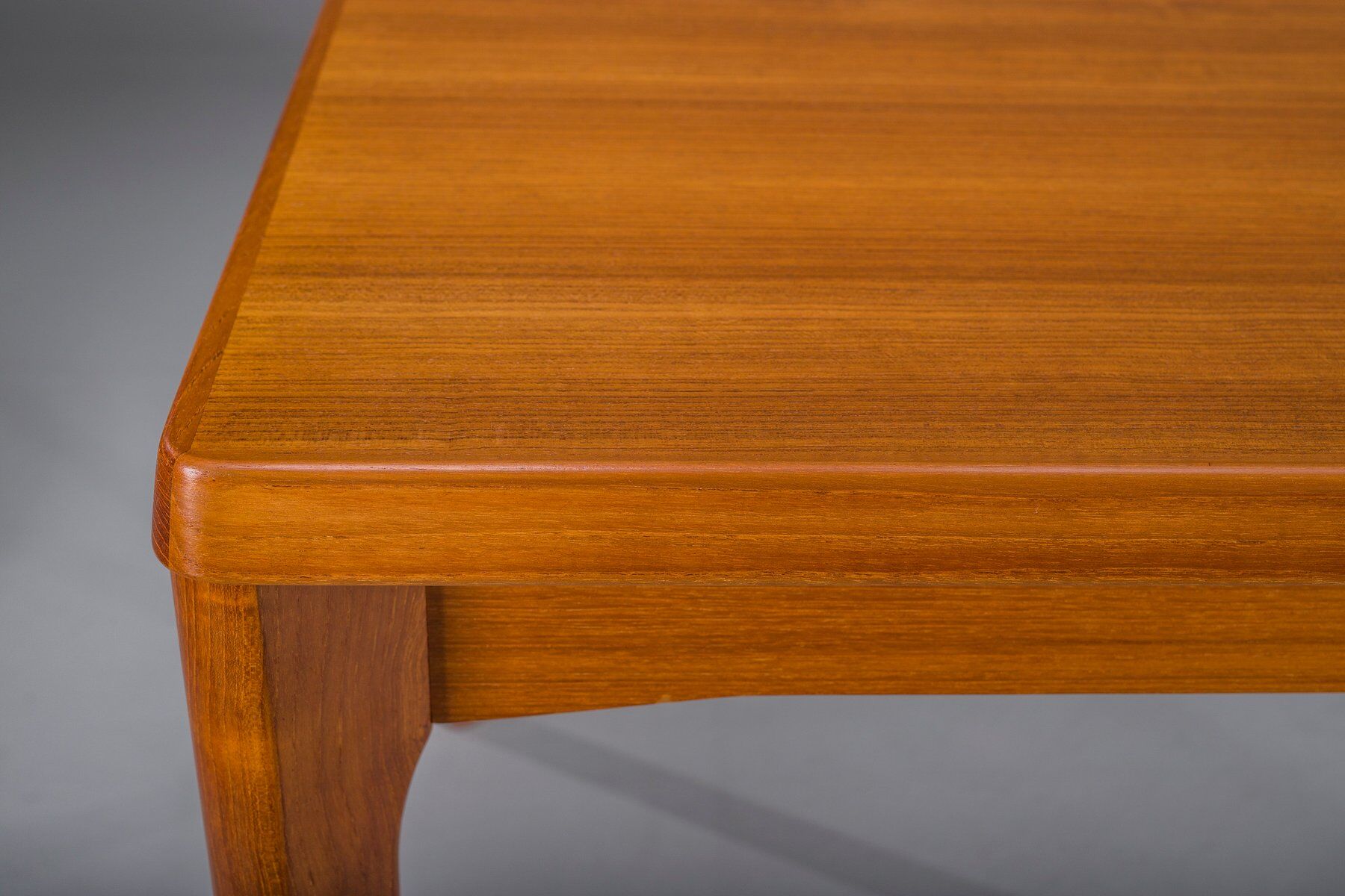 Extendable teak dining table by Henning Kjaernulf for Vejle Stole & Møbelfabrik