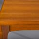 Extendable teak dining table by Henning Kjaernulf for Vejle Stole & Møbelfabrik