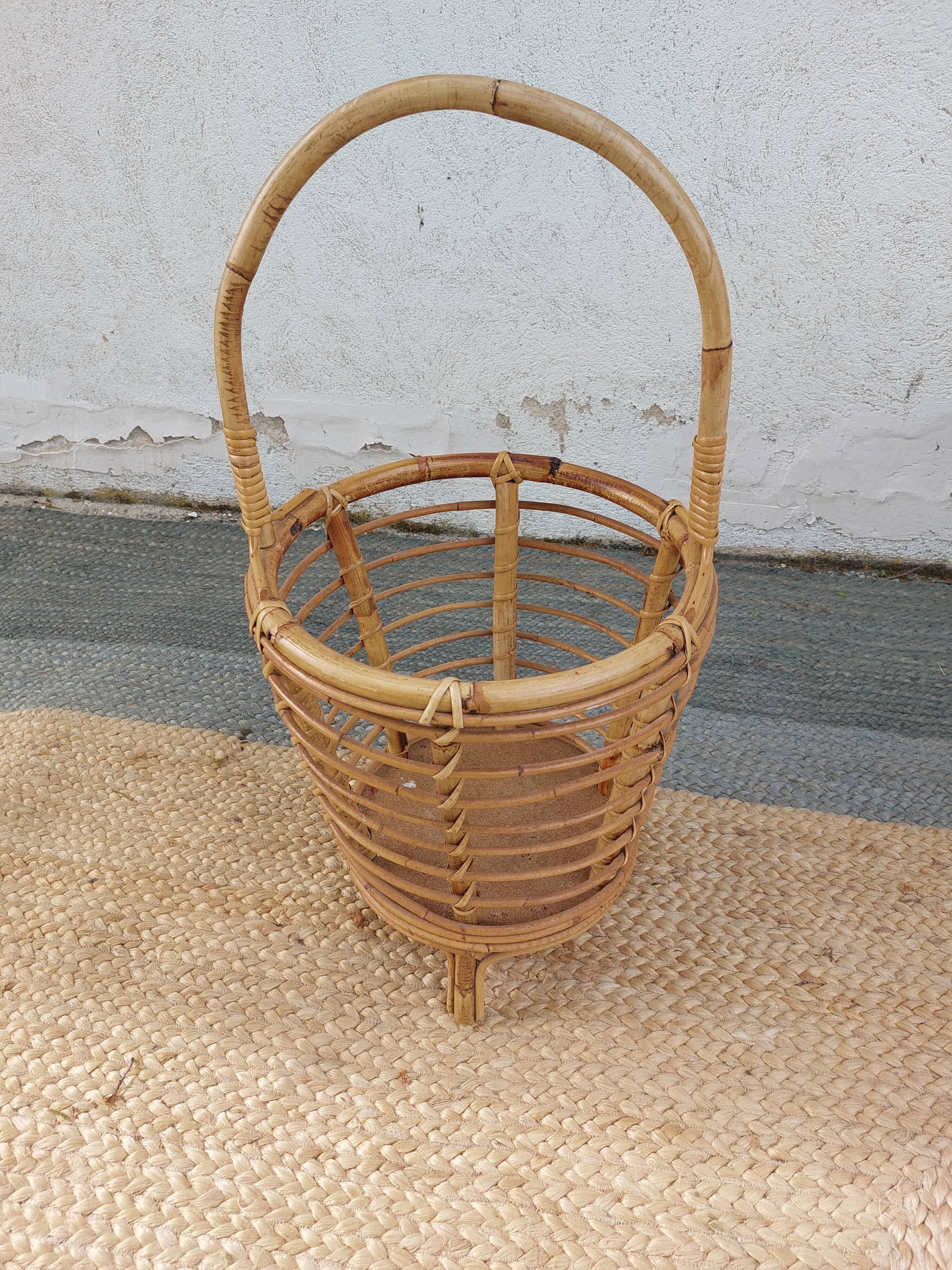 4 armchairs and a coffee table made of rattan and bamboo wood, vintage.