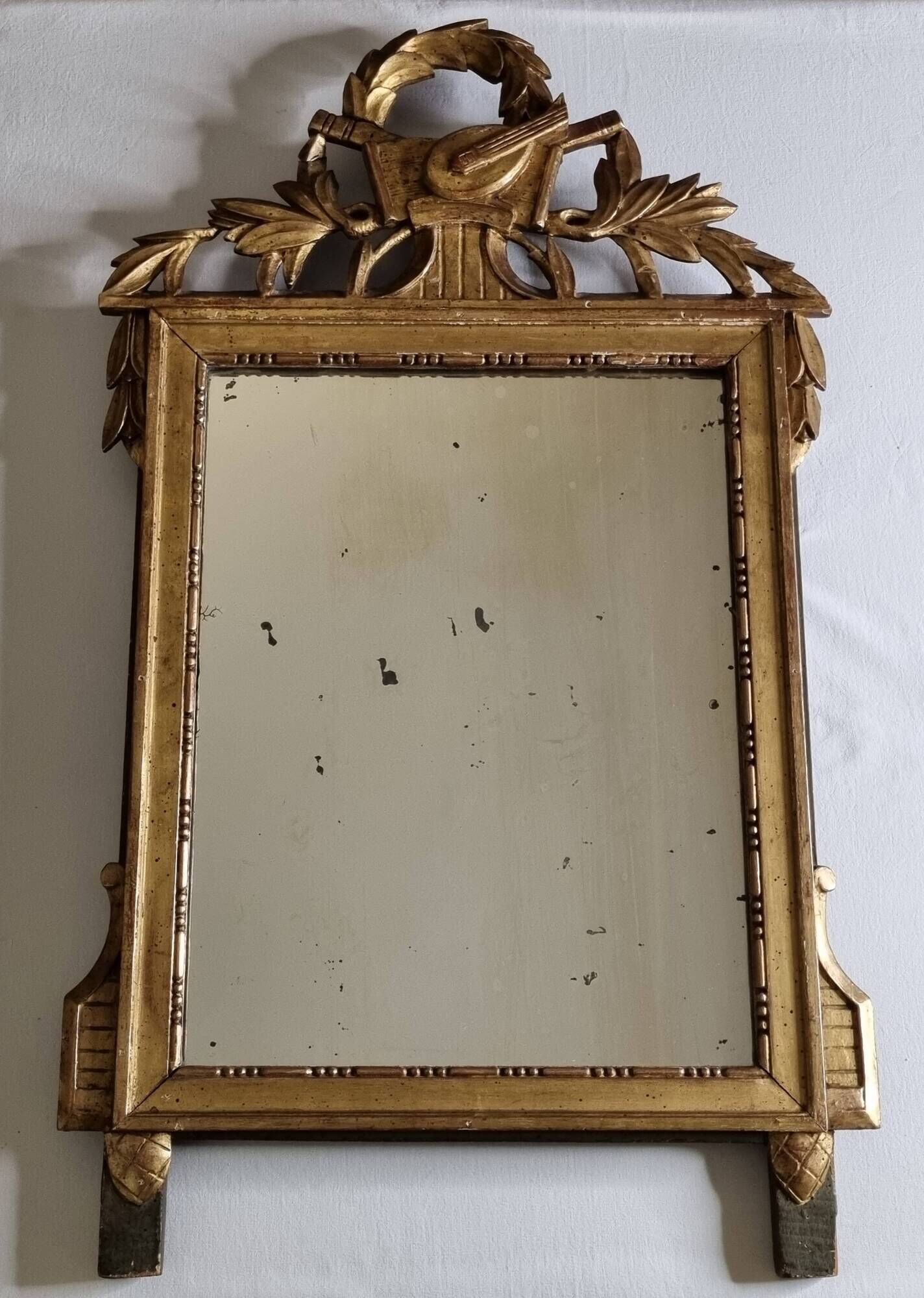 Antique carved and gilded wooden mirror, Louis XVI style – 54 x 92 cm