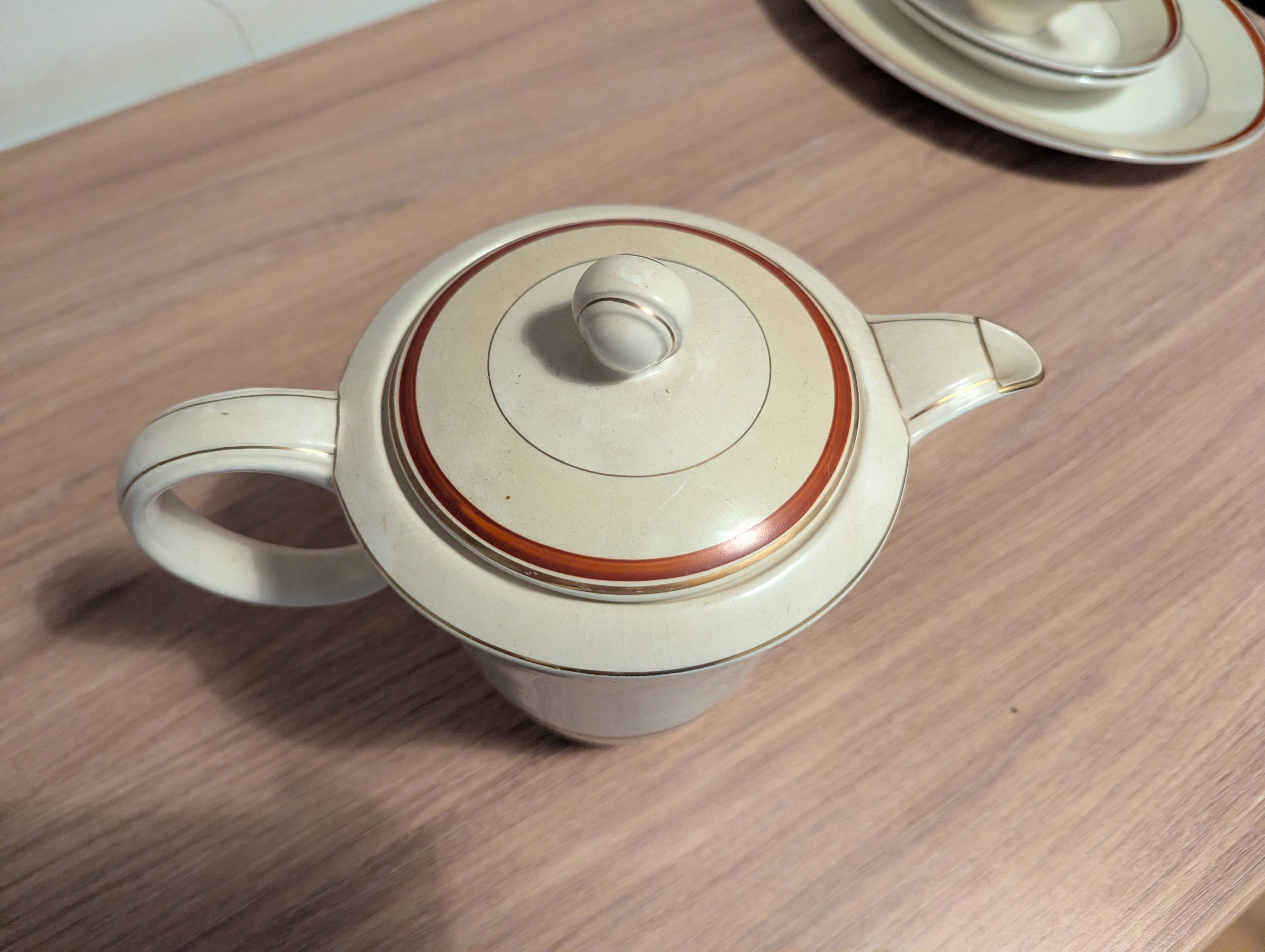 Large Longchamp set in France in earthenware Tea service, serving pieces