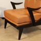 Paire de fauteuils vintage années 50 en bois noir et cuir caramel