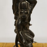 Lamp monkey learned juggler in patinated bronze