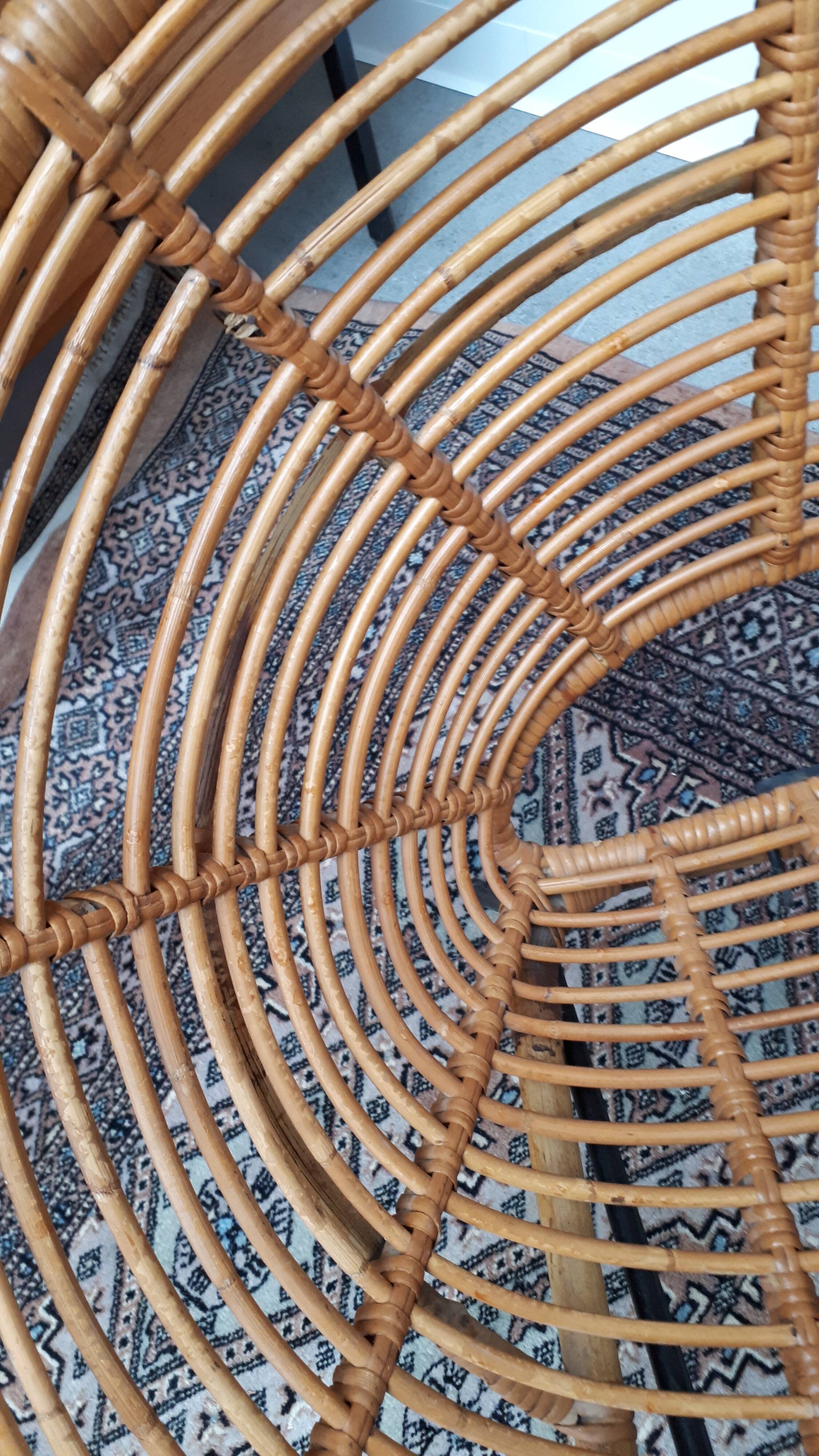 Set of armchairs "soleil" and rattan table of the years 50