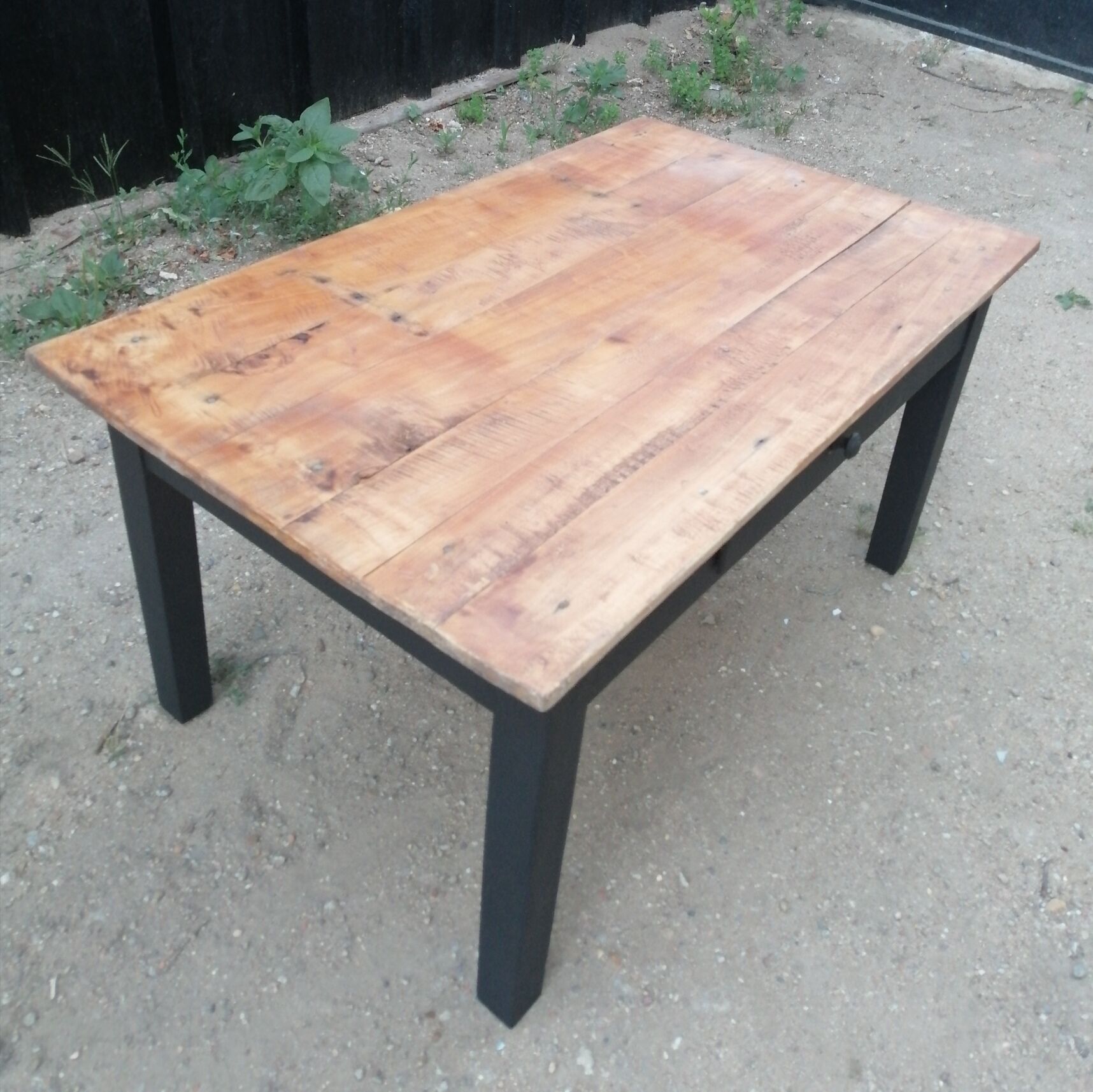 Wooden coffee table with a drawer