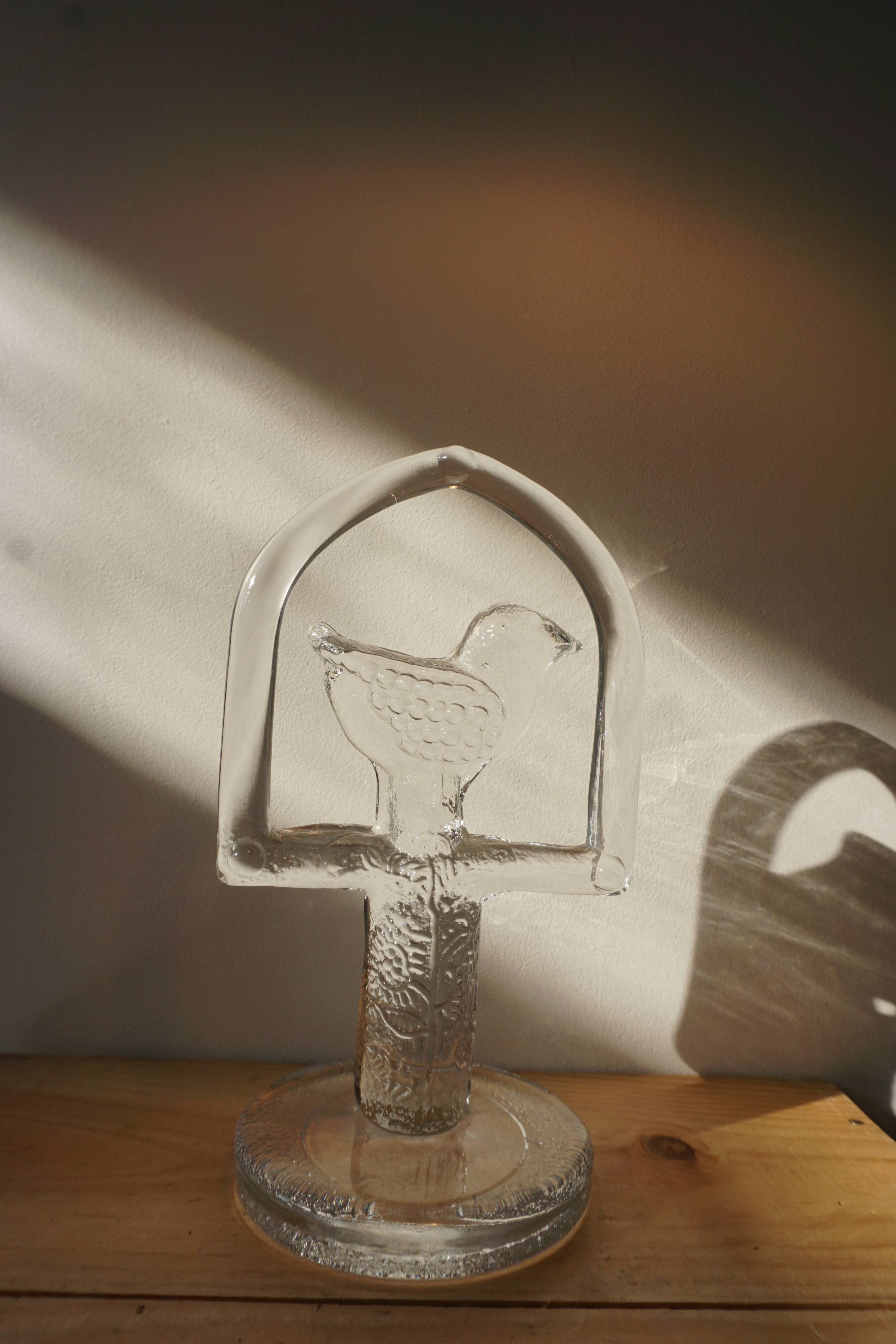 Glass bird suncatcher sculpture