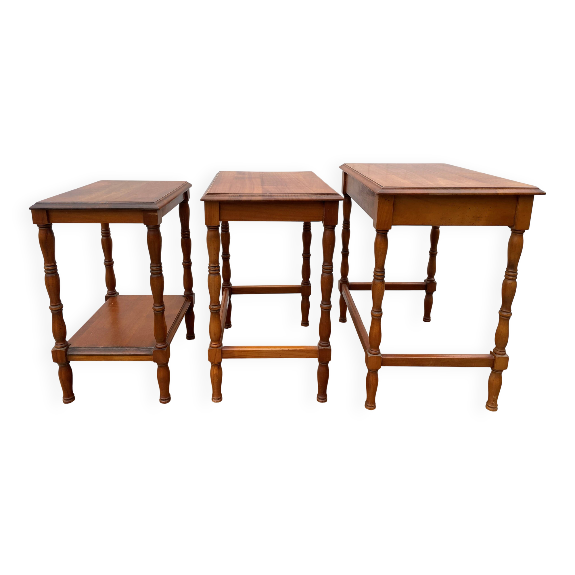 Set of 3 rustic cherry wood nesting coffee tables from the 1950s.