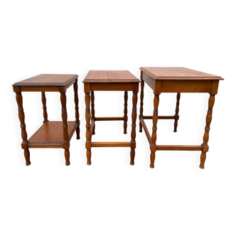 Set of 3 rustic cherry wood nesting coffee tables from the 1950s.