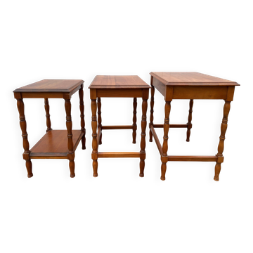 Set of 3 rustic cherry wood nesting coffee tables from the 1950s.