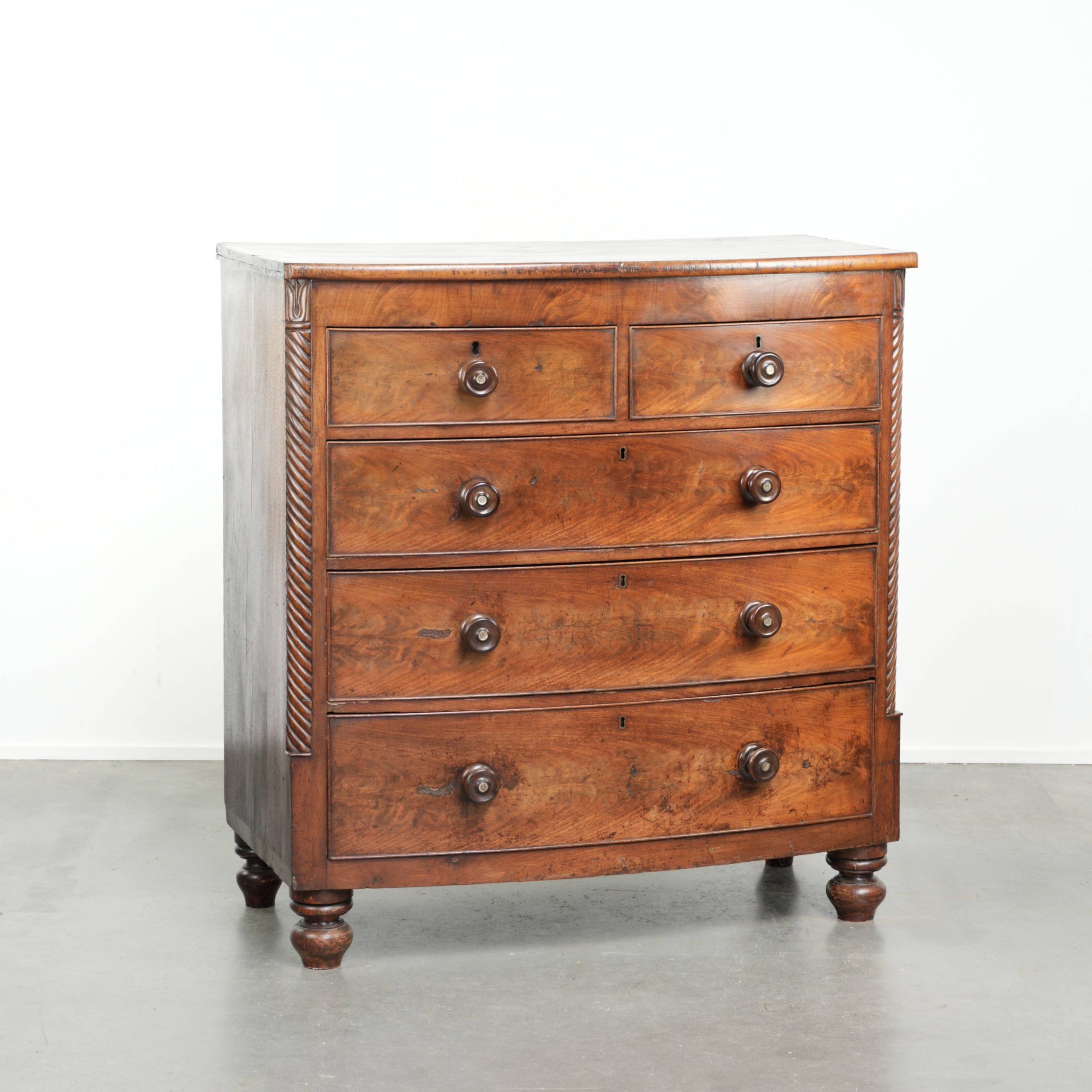 Antique 19th century English chest of drawers/commode with bow front