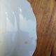 Old flat plate, vintage blue flowered earthenware border